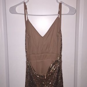 Beautiful long open back sequin prom gown